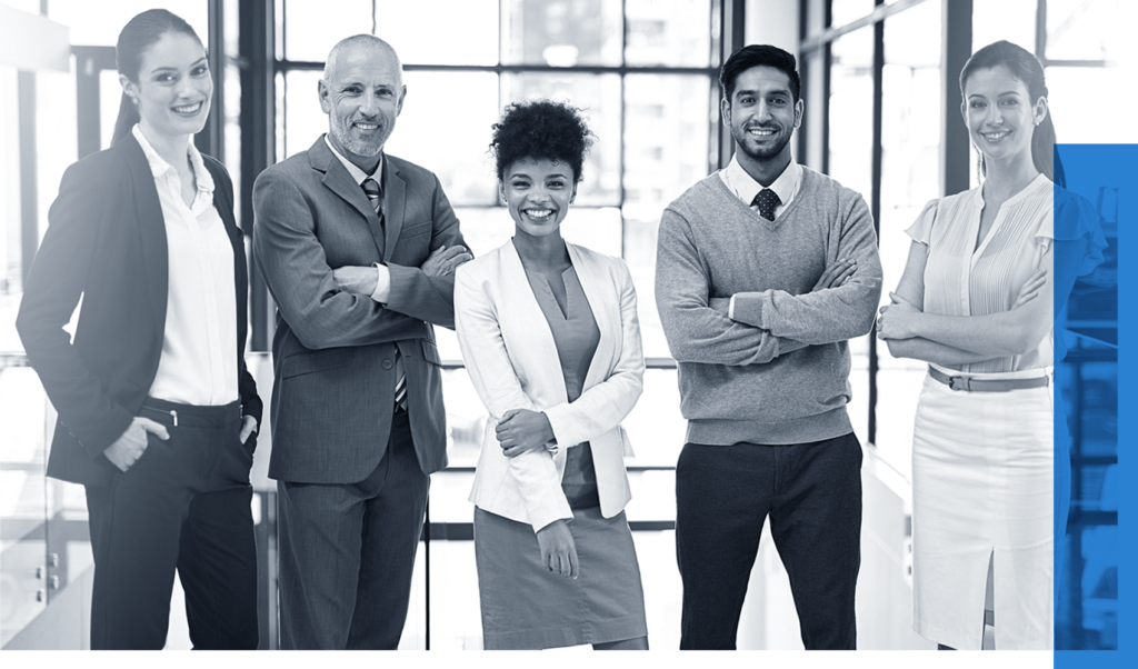 Diverse team of consultants standing in power poses facing out